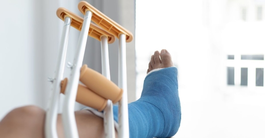 Foot in Cast with Crutches